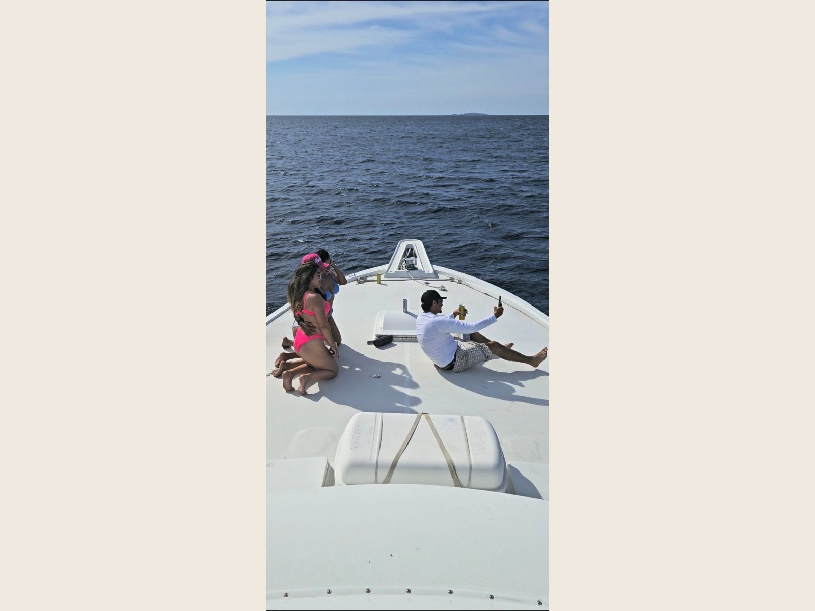 Guests sunbathing on the open bow of Steel n Time