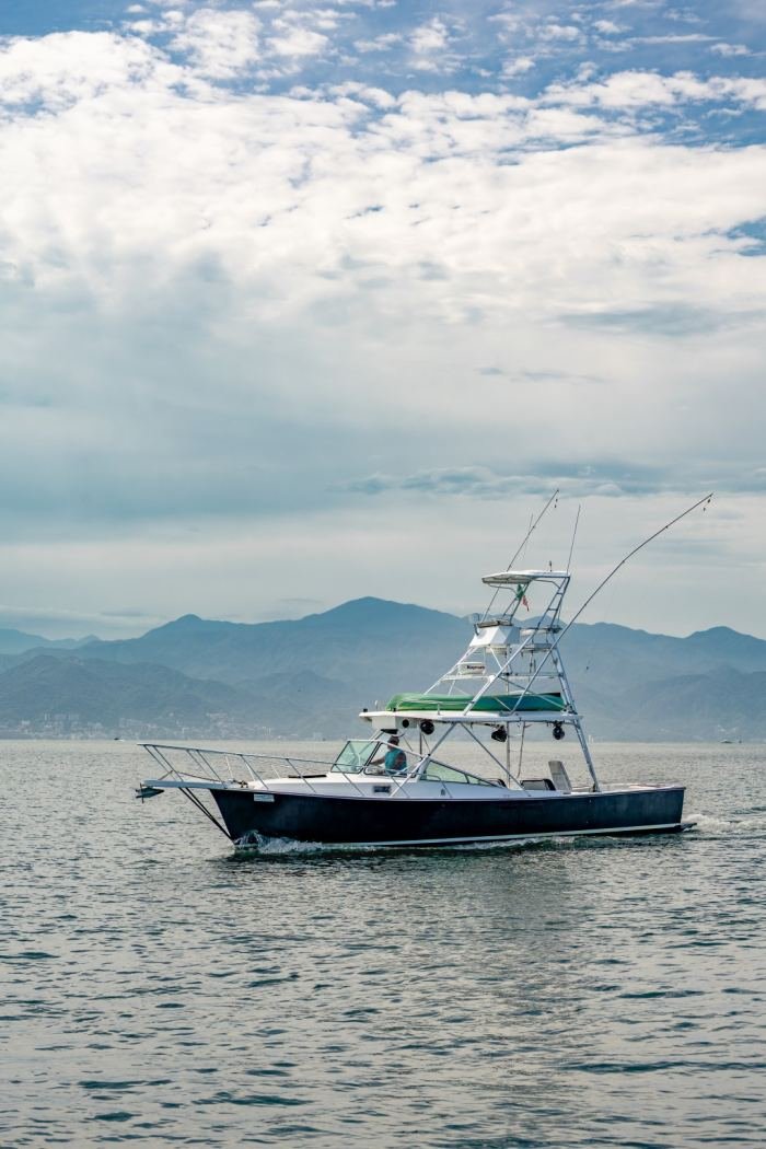 Guanatuna cruising with the mountains of Cabo Corrientes in the distance